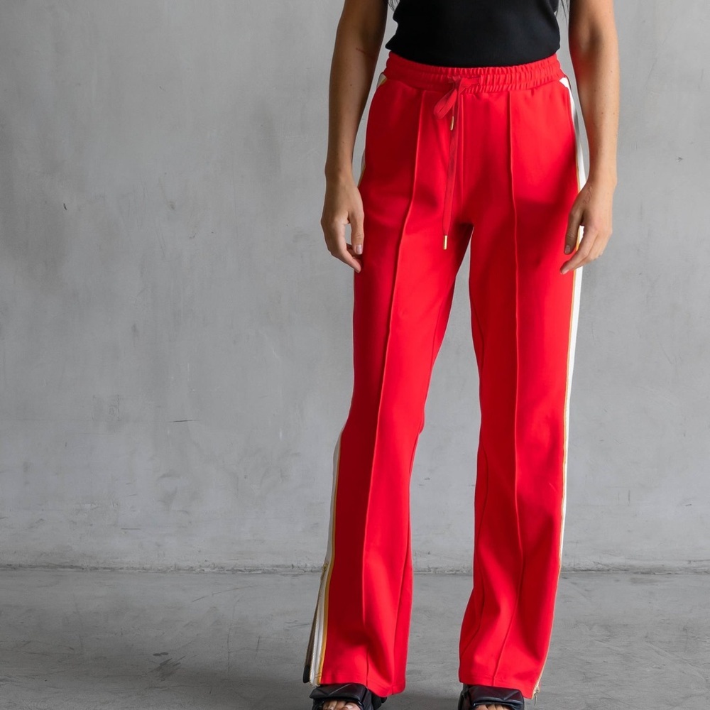 CARE TUCKER JORDAN TRACK PANTS CHERRY BOMB